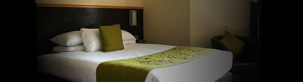 Damon'S Hotel Линкольн Экстерьер фото