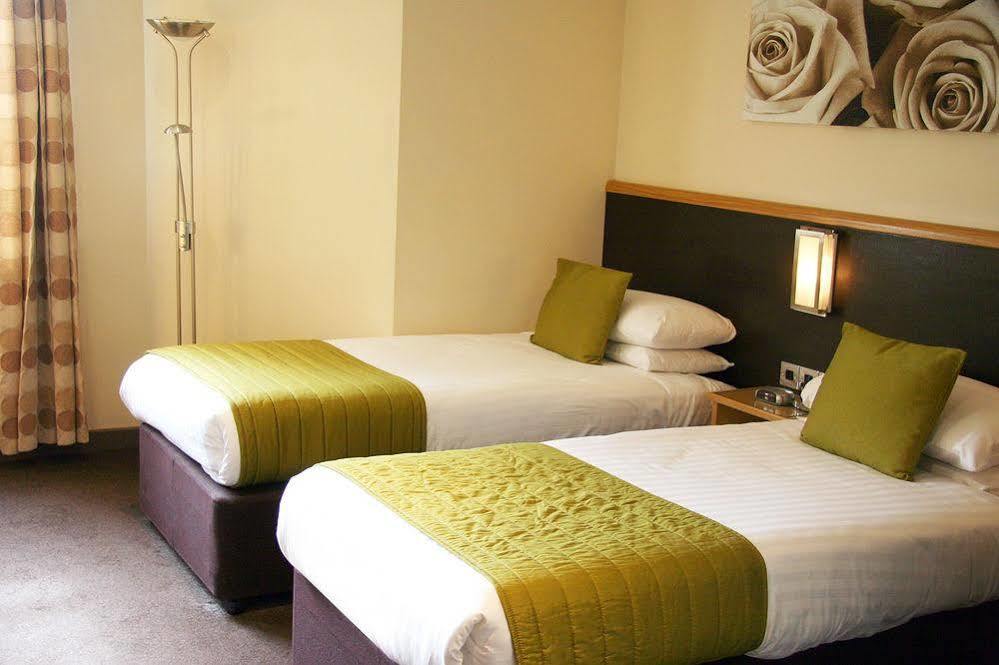 Damon'S Hotel Линкольн Экстерьер фото