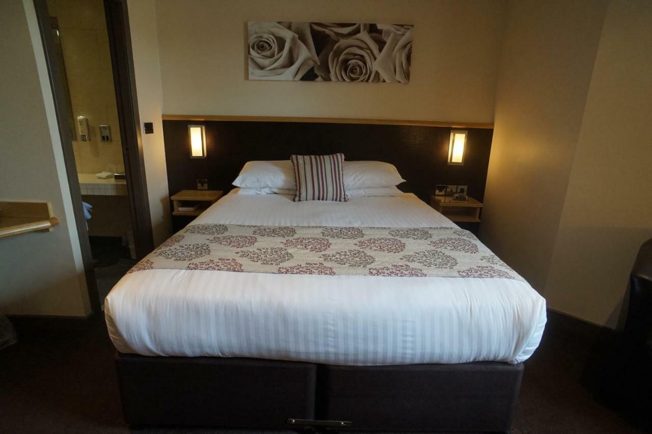 Damon'S Hotel Линкольн Экстерьер фото